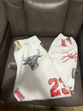 Women’s Jordan White Graphic Jogger Pants with Red Accents